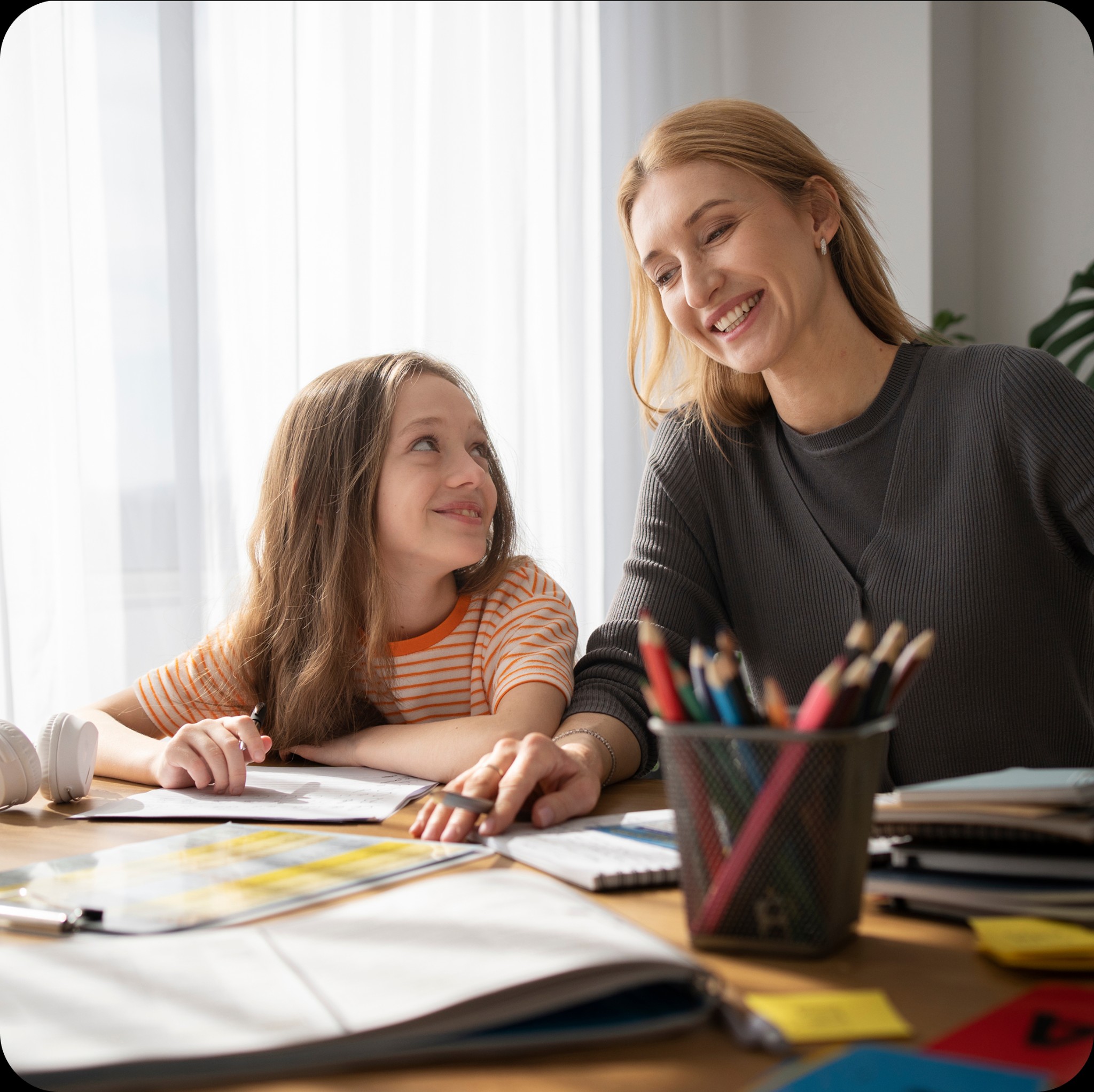 Woman and girl learning together